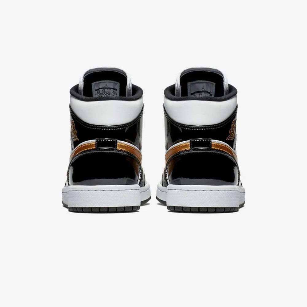 Jordan 1 Mid nero lucido bianco oro