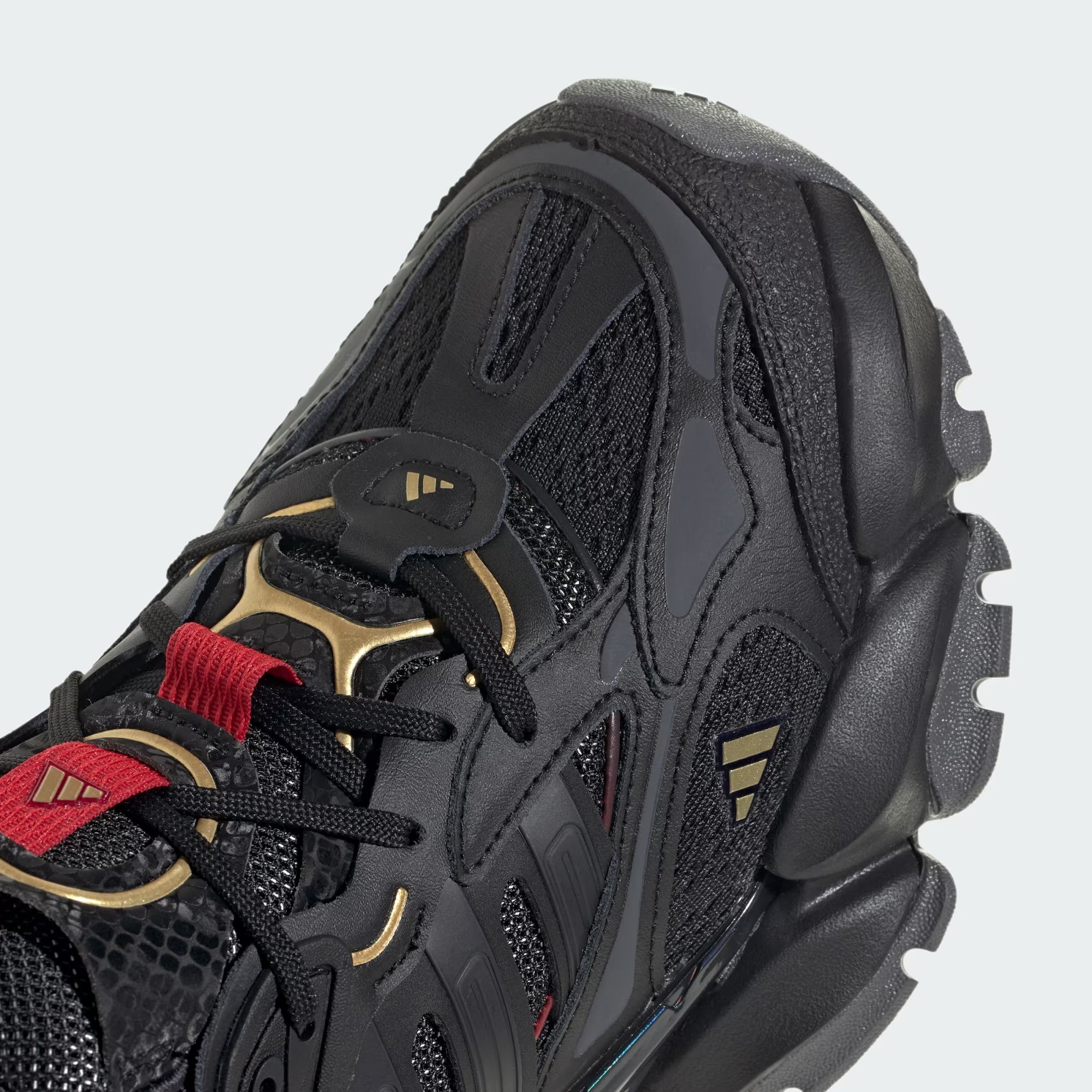 Adidas XLG Runner Deluxe Black Gold Metallic Red